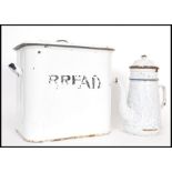 A vintage retro 20th century enamel bread bin along with a French enamel coffee pot. The bread bin