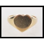 A 9ct gold hallmarked signet ring. Hallmarked London 1979. Weight 4.1g. Size T.