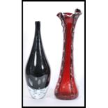 Two vintage retro 20th Century studio art glass vases of large tall form comprising of a red