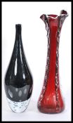 Two vintage retro 20th Century studio art glass vases of large tall form comprising of a red