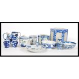 A collection of Chinese blue and white ceramics to include an insect plate, small spice jars, two