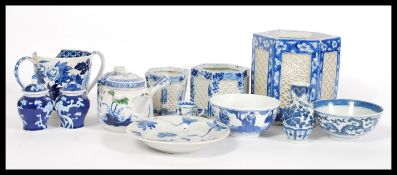 A collection of Chinese blue and white ceramics to include an insect plate, small spice jars, two