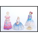 Three Royal Doulton figurines Bridesmaid, Chloe and Pantalettes' HN1362. Painted and printed marks