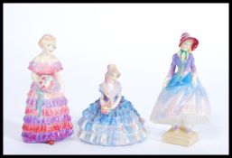 Three Royal Doulton figurines Bridesmaid, Chloe and Pantalettes' HN1362. Painted and printed marks