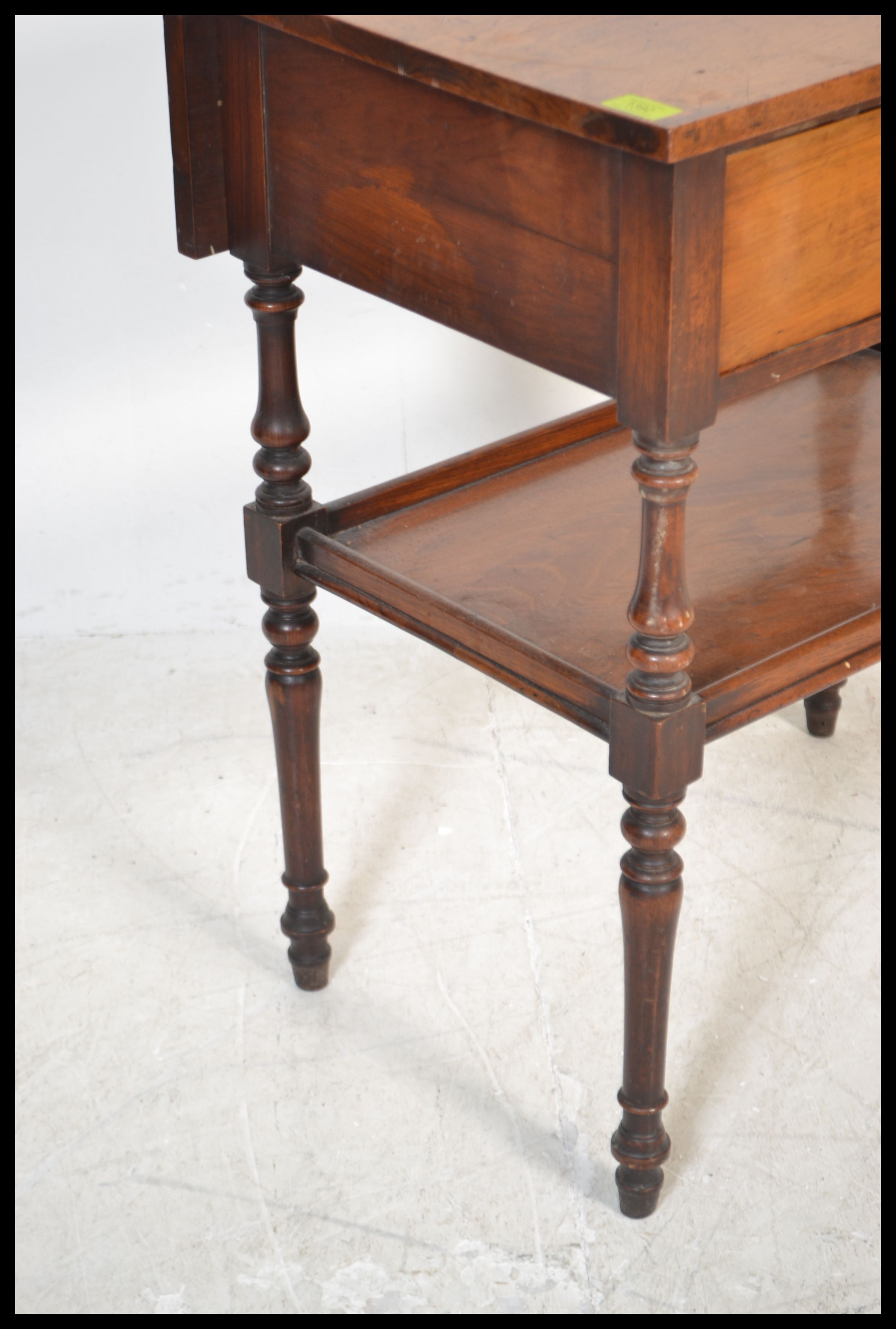 A Victorian mahogany side / lamp table being raised on turned legs with lower tier under single - Image 3 of 6