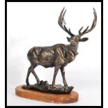 A large and impressive 20th century antique style bronze effect figure of a Deer / Stag. Mounted