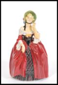 A Royal Doulton large ceramic figure entitled Margery HN1413. Stamped to base. Measures 28cm high.