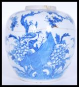 A 17th Century Chinese Kangxi period (1661-1722) ceramic blue and white ginger jar being hand