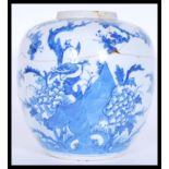 A 17th Century Chinese Kangxi period (1661-1722) ceramic blue and white ginger jar being hand