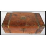 A 19th Century Victorian large brass bound mahogany writing box having hinged lid opening to