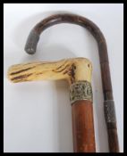 Two 19th Century Victorian walking stick canes to include an example with tapering malacca shaft