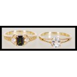 Two hallmarked 9ct gold rings to include a tourmaline and white topaz ring (size N.5) and a