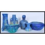 A collection of Bretby 1930's ceramics having a mottled blue and green drip glaze to include a