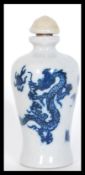A 19th Century Chinese blue and white perfume scent bottle vase of baluster form having hand painted
