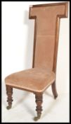 A 19th Century Victorian mahogany Prie Dieu Prayer chair raised on turned and block legs with