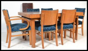 A stunning bespoke 1930's  Art Deco burr walnut dining table suite, consisting of a large slab top