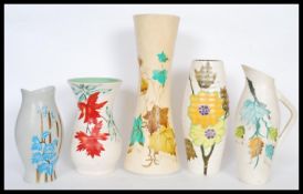 A selection of mid 20th Century ceramics to include two Ellgreave vases hand painted with leaves and