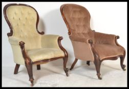 A non matched pair of 19th Century Victorian mahogany spoon back armchairs. Each chair raised on