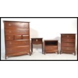 A Stag Minstrel mahogany tallboy chest of four long and three short drawers together with a matching