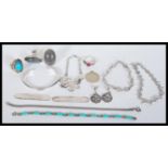 A selection of silver jewellery to include drop earrings, a labradorite ring, a turquoise stone