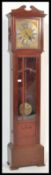 An early to mid 20th Century mahogany cased long case / grandfather clock, brass face with Roman