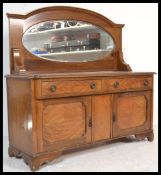 A vintage 20th Century circa 1930's mahogany mirror back sideboard with two doors and two drawers,