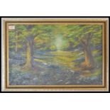 A 20th Century oil on board painting by B. E. Sissen depicting a woodland scene set within a