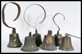 A rare set of six 19th Century Victorian bronze servants bells of typical form complete with
