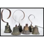 A rare set of six 19th Century Victorian bronze servants bells of typical form complete with