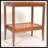 A 1960's retro vintage Danish teak wood two tier cocktail / tea trolley, removable tray to the