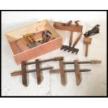 A selection of vintage 20th Century tools to include a pair of Astor lawn shears, a Stanley plane, a