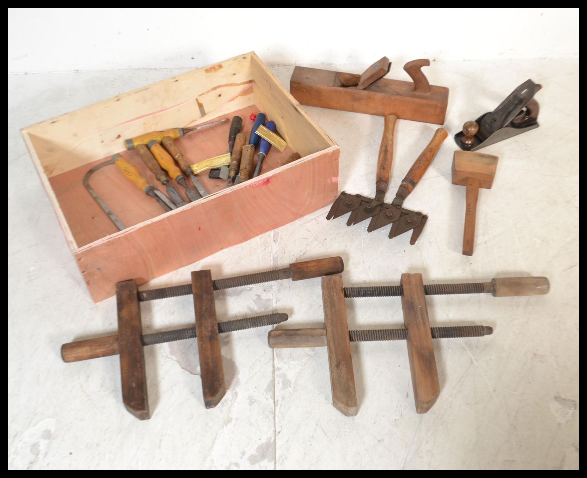 A selection of vintage 20th Century tools to include a pair of Astor lawn shears, a Stanley plane, a