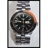 A vintage retro 1960's Bulova Snorkel Automatic 666 Feet diving watch having a black dial with