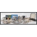 A collection of vintage silver plate and plated wares to include teapot, large gravy boat, trays,