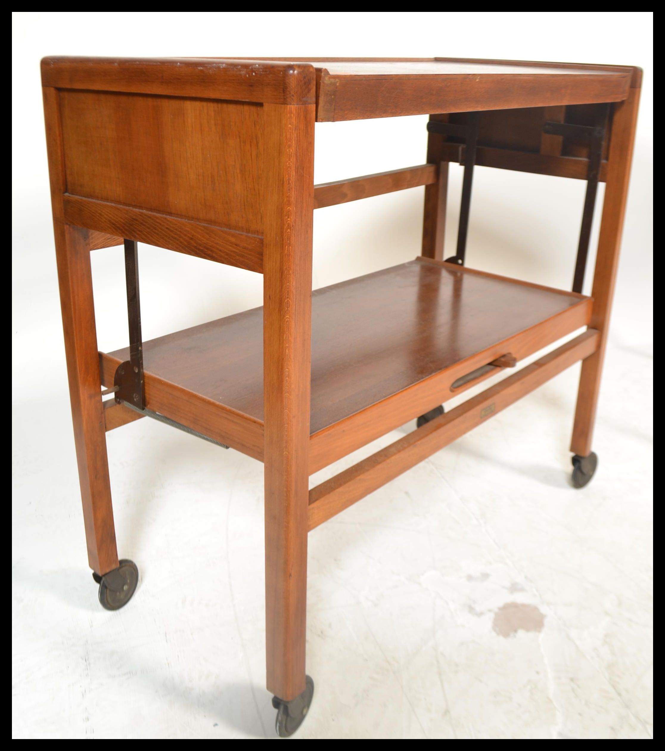 A vintage mid 20th Century teak wood metamorphic buffet trolley raised on square supports on castors - Image 4 of 7
