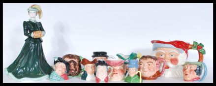 A collection of 20th Century toby jugs to include exampled by Royal Doulton together with a Coalport