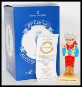 A Royal Doulton ceramic advertising figure for ' The Milkybar Kid , AC7, limited edition no. 523 /