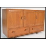 Ercol - Windsor - A 1960's retro vintage beech and elm sideboard comprising of a set of three