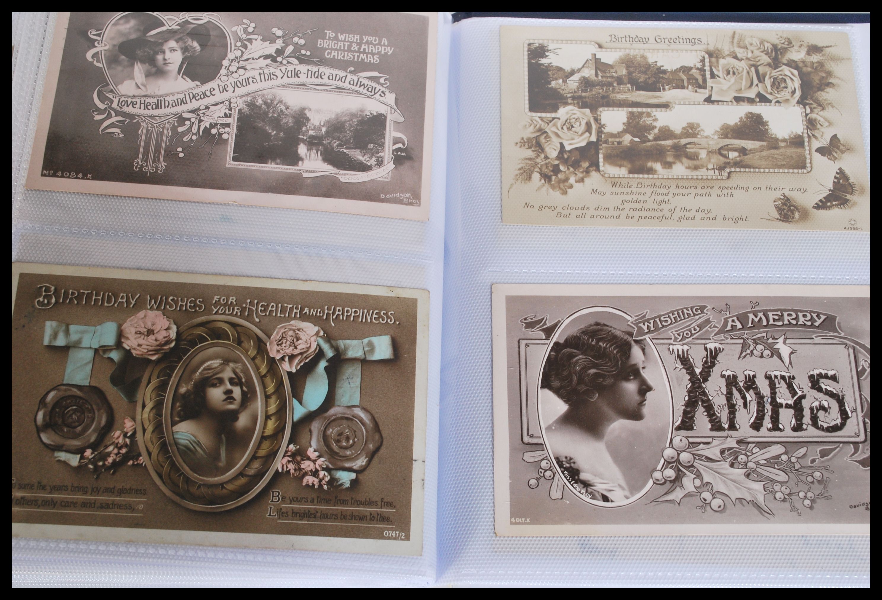 Two albums of vintage postcards dating from the early 20th Century including many examples of - Image 5 of 6
