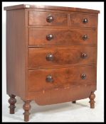 A 19th Century Victorian flame mahogany bow fronted chest of two over three graduated drawers fitted