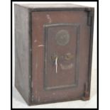 A 19th Century Victorian cast iron painted safe of rectangular form with brass makers plaque to