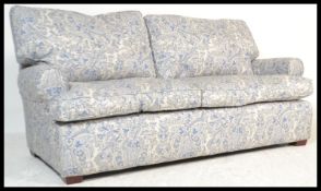 A 20th Century contemporary sofa three seater settee in the manner of Howards and Sons,