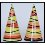 A pair of  Crown Devon sugar shakers in the style of Clarice Cliff hand painted by Dorothy Ann in