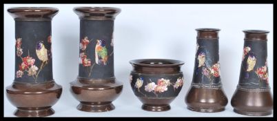 A selection of early 20th Century Bretby Art Nouveau vases, having a bronzed brown glaze with