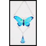 A sterling silver and enamel butterfly panel necklace having bolt ring clasp. Weighs 23.2 grams.