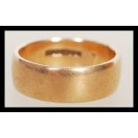 A gents 9ct gold hallmarked band ring, Birmingham assay marks, date letter for 1963, makers marks