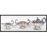 A 19th Century silver plated tea set comprising of tea pot, creamer and sugar bowl, in the Rococo