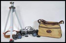 A collection of vintage cameras and accessories to include Fujica ST605N with a Super Ozeck lens no.