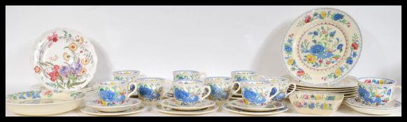 A Mason's part dinner / tea service in the Regency pattern having printed blue floral sprays to