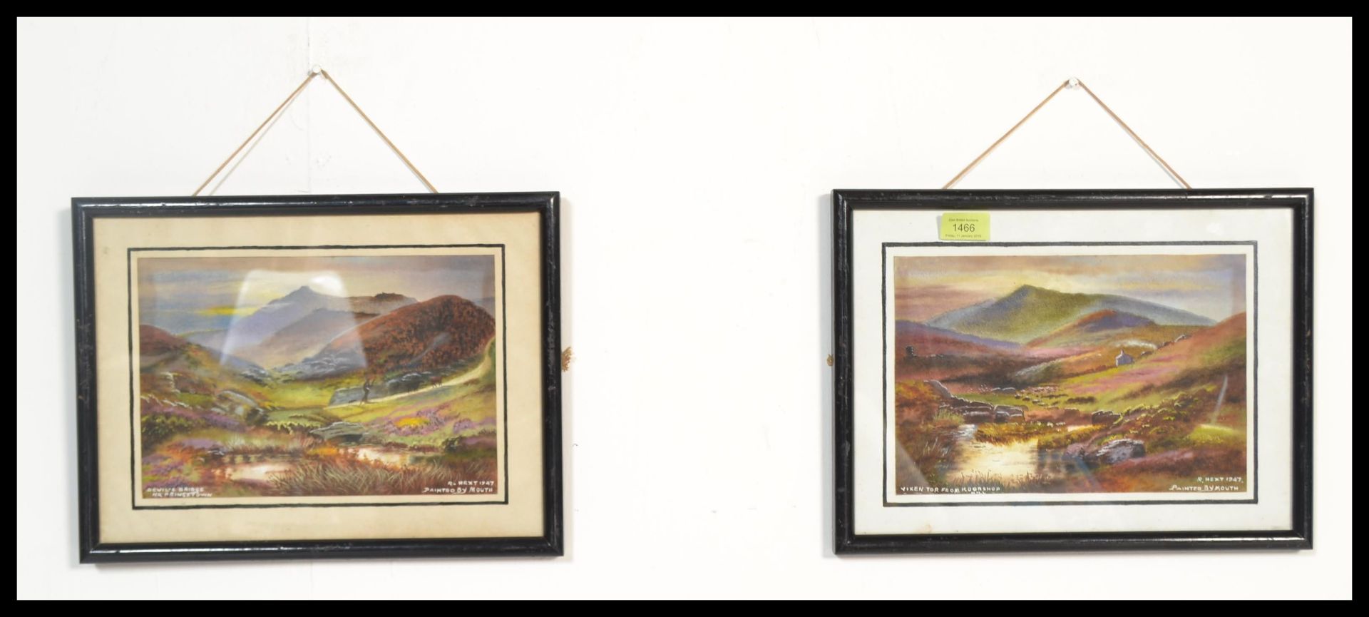A pair of framed watercolour paintings of moorland